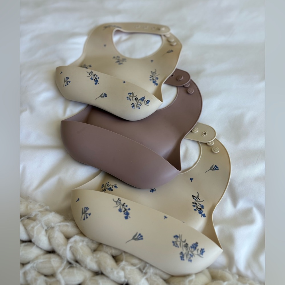 3 mushie bibs. Pink, blue flower ivory